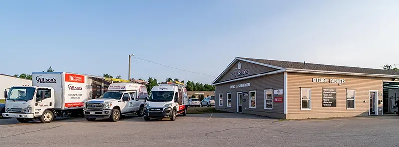 Allison's Manufacturing Ltd business building with trucks