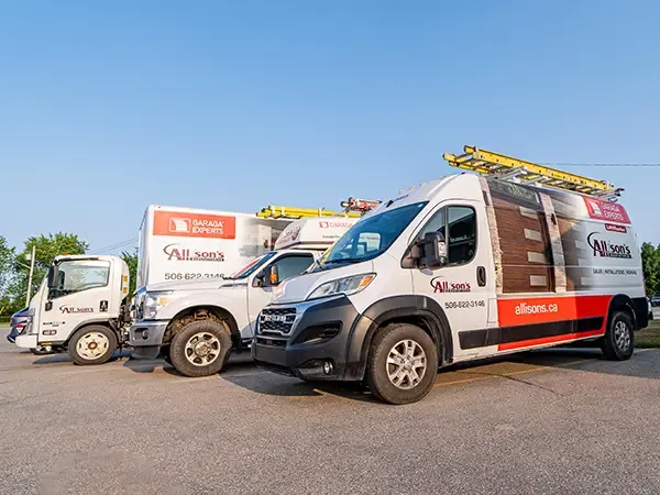 Garage door Allison's Manufacturing Ltd company trucks