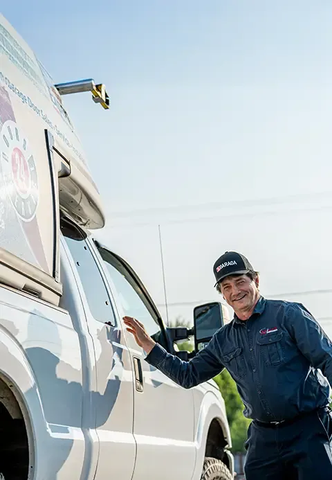 An installer from Allison's Manufacturing LTD ready to board his service truck